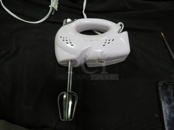 One Turbo Hand Mixer.