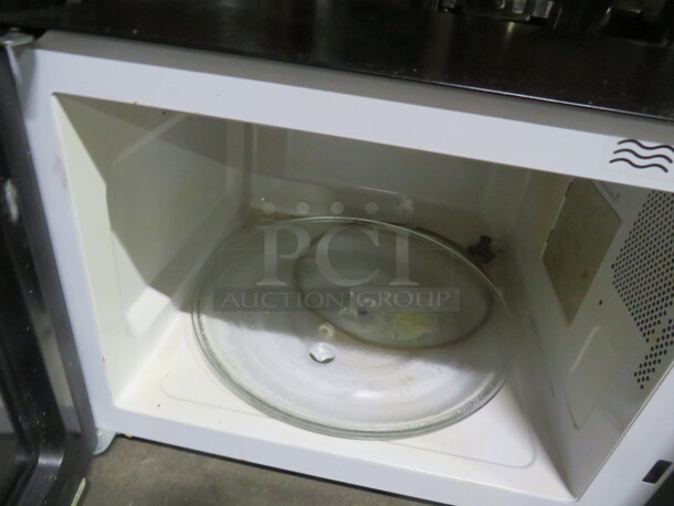 One Oster Microwave. Model# EG034AL7X1. 120 Volt. 20X16X12 - Image 2 of 2
