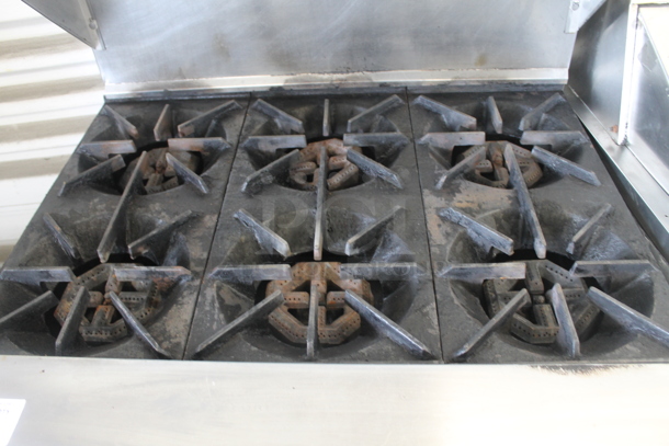 Garland SunFire SX-6-26 Stainless Steel Commercial Natural Gas Powered 6 Burner Range w/ Oven, Over Shelf and Back Splash.  - Image 5 of 9