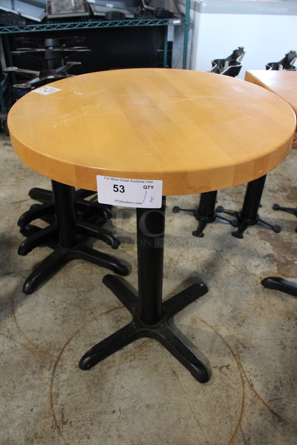 Round Wooden Butcher Block Tabletop on Black Metal Table Base. Stock Picture - Cosmetic Condition May Vary. 24x24x30