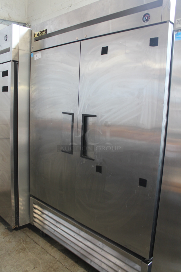 2013 True T-49F ENERGY STAR Stainless Steel Commercial Two Door Reach In Freezer w/ Poly Coated Racks on Commercial Casters. 115 Volts, 1 Phase. Tested and Working! - Image 1 of 9