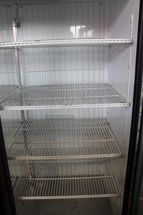 2016 True GDM-72F-HC-LD ENERGY STAR Metal Commercial 3 Door Reach In Freezer Merchandiser w/ Poly Coated Racks. 115/208-230 Volts, 1 Phase.  - Image 5 of 8