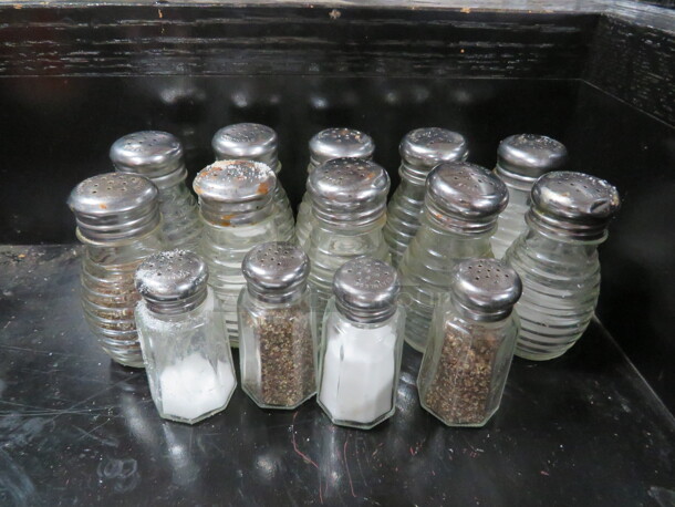 One Lot Of Salt/Pepper Shakers.