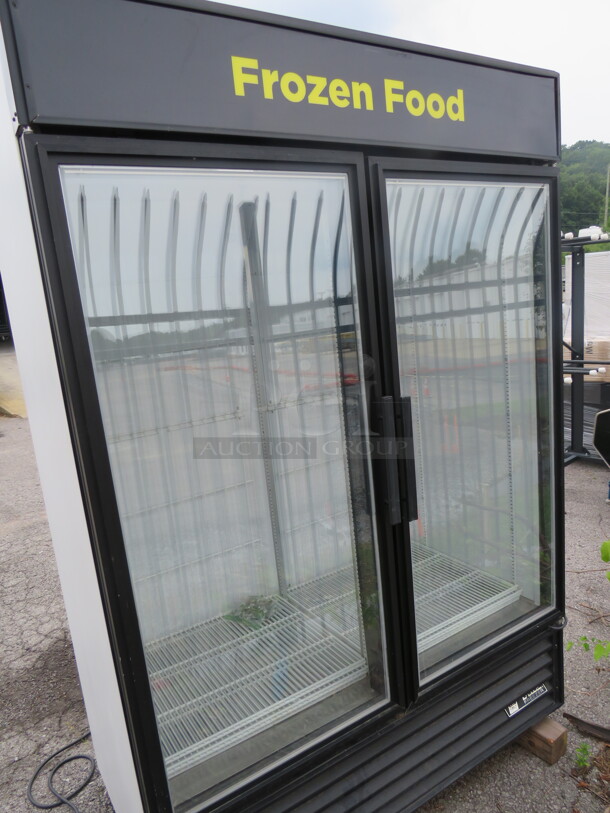One True 2 Door Glass Display Freezer With 8 Racks On Casters. Model# GDM-49F-LD. 115/208/230 Volt. Unable To Test. 49X30X80 - Image 1 of 3