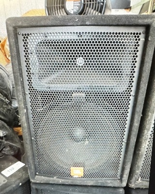 One JBL JAX100 Speaker.