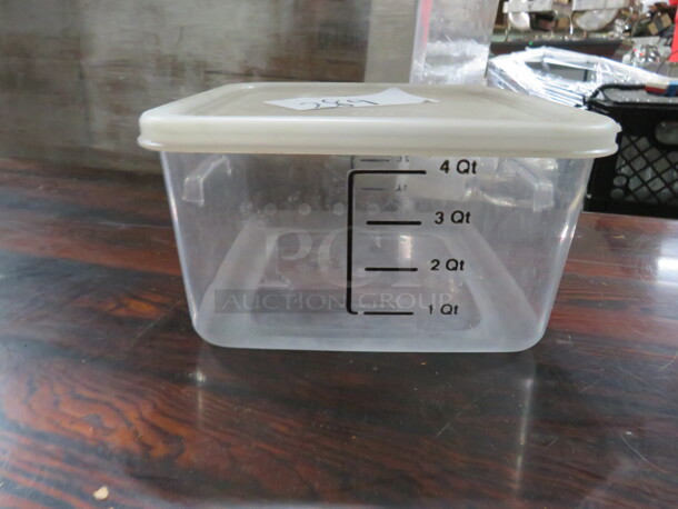 One 4 Quart Food Storage Container With Lid.