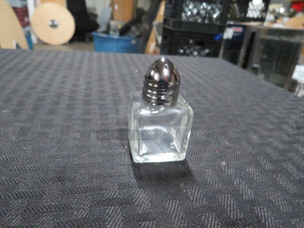 One Lot Of 12 NEW 1/2oz Salt/Pepper Shakers. - Image 1 of 1