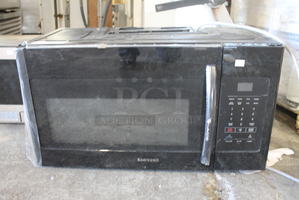 2014 Samsung Metal Microwave Oven. 120 Volts, 1 Phase.