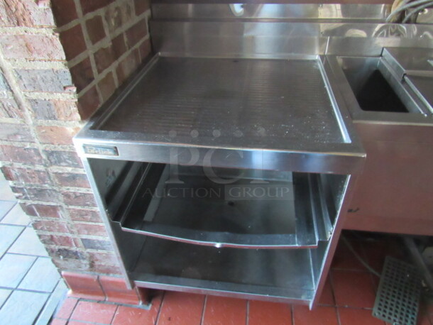 BUYER MUST REMOVE! One Stainless Steel Perlick Under Bar Drain Table, With Under Shelf. 24X25X32