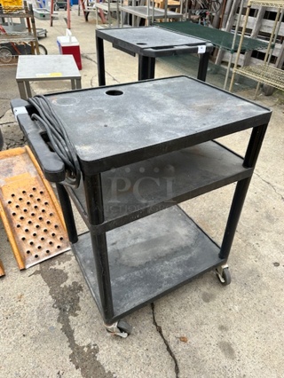 One Apollo Cart With 3 Shelves, And Outlets, On Casters. Leg Messed Up But Works Fine. See Pic. 27X18X33