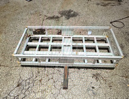 One Aluminum Tow Carrier. Cracked. See Pics. 49X24X9.5