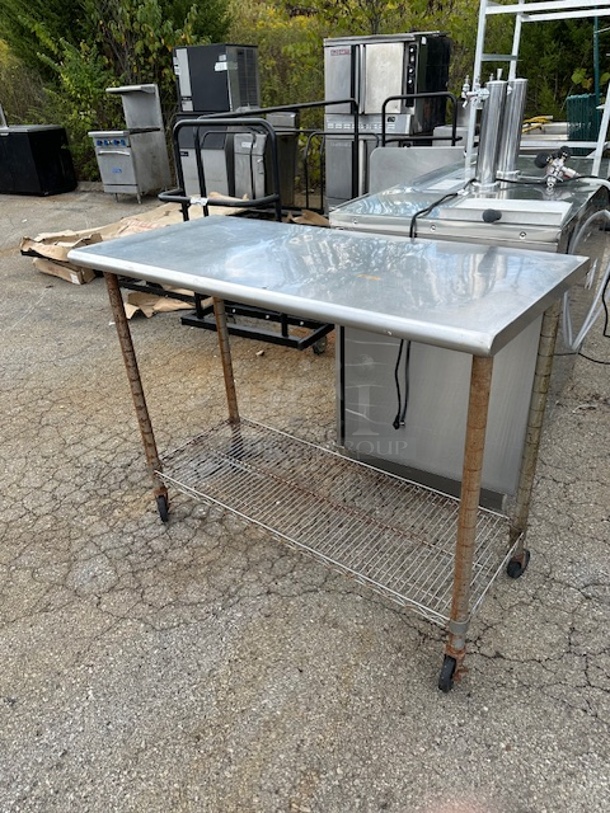 One Stainless Table With A Metro Under Shelf On Casters. 50X24X39 - Image 1 of 1