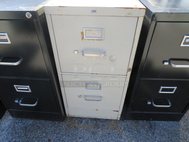 One Hon 2 Drawer Metal File Cabinet. 15X25X29