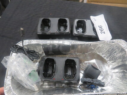 One Lot Of 3 Dewalt Chargers, And 2 Cords.