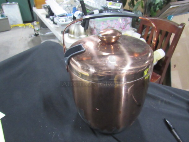 One Copper Color Ice Bucket With Lid.