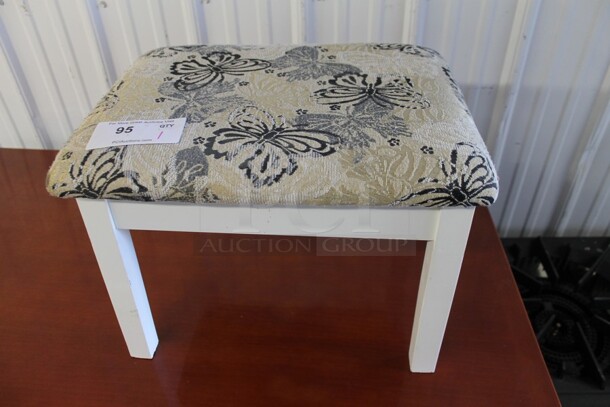 White Footstool w/ Butterfly Patterned Cushion.