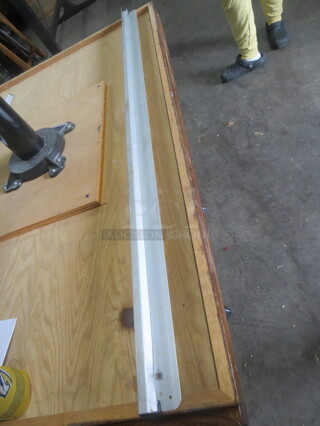 One 36 Inch Ticket Rail.