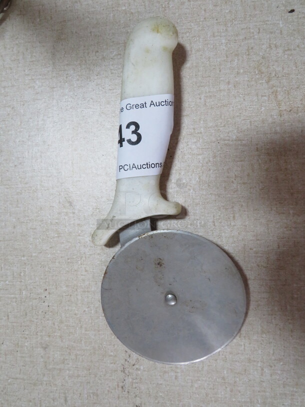 One Pizza Cutter - Image 1 of 1