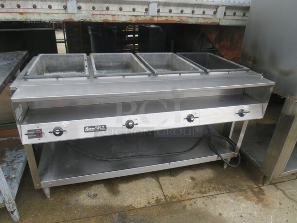 One Vollrath Serve Well 4 Well Steam Table With SS Under Shelf. Model# 38104. 120 Volt. 60.5X33X34
