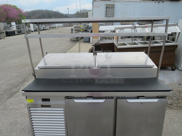 One WORKING Stainless Steel Traulsen 2 Door Refrigerated Prep Table With 2 SS Over Shelves And 4 Racks, On Casters. Model# TS066HT-ZCF03. 66X33X65 - Image 2 of 2