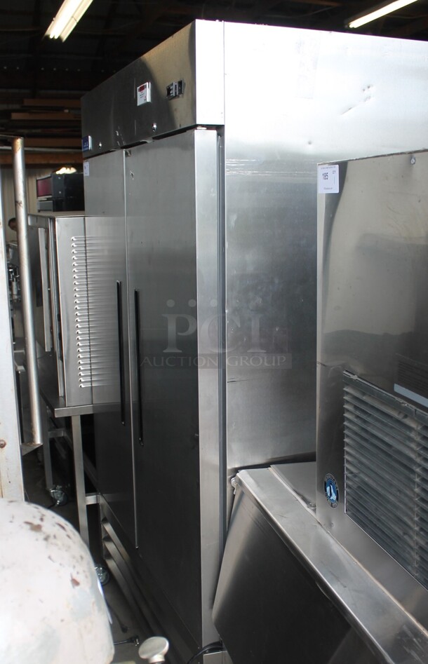 Arctic Air AR49E ENERGY STAR Stainless Steel Commercial 2 Door Reach In Cooler  w/ Poly Coated Racks. 115 Volts, 1 Phase. Tested and Does Not Power On - Image 1 of 10