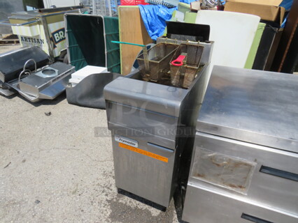 One Frymaster Natural Gas Deep Fryer With 2 Baskets On Casters. #MJ140. 16X32X46. $4893.00