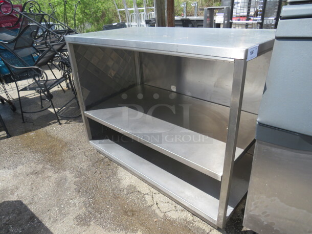 One Stainless Steel Table/Counter/Cabinet Wit 2 SS Undershelves. Enclosed On 2 Sides. 58X30X44.5 - Image 1 of 3
