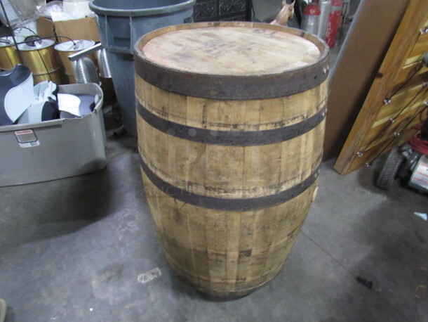 One Whiskey Barrel On Casters.