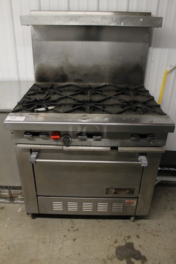 Garland H286 Stainless Steel Commercial Natural Gas Powered 6 Burner Range w/ Oven, Over Shelf and Back Splash. 