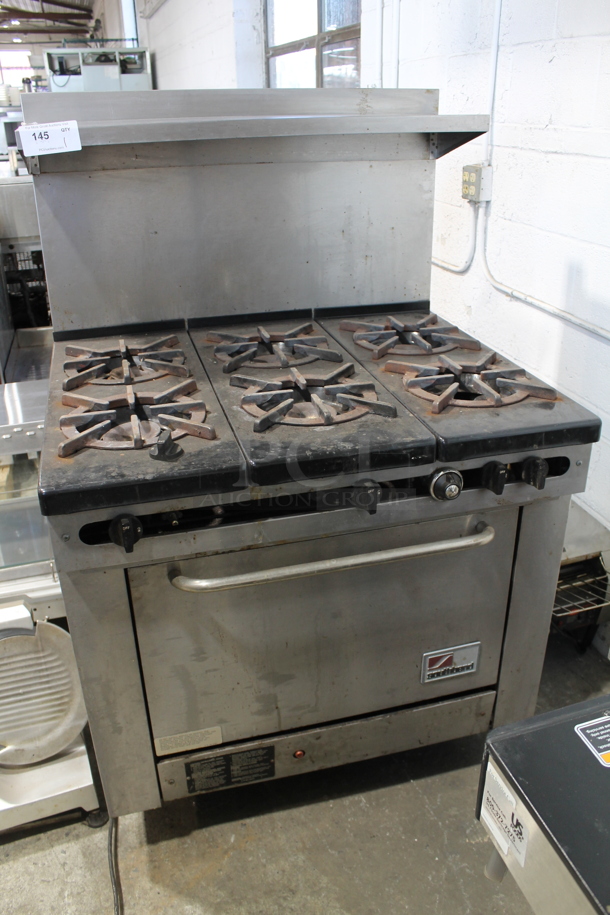 Southbend 300F Stainless Steel Commercial Natural Gas Powered 6 Burner Range w/ Oven, Over Shelf and Back Splash.