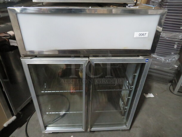 One Taylor 2 Door Glass Refrigerator With 2 Racks. 115 Volt. #890-12. 27X27X39.