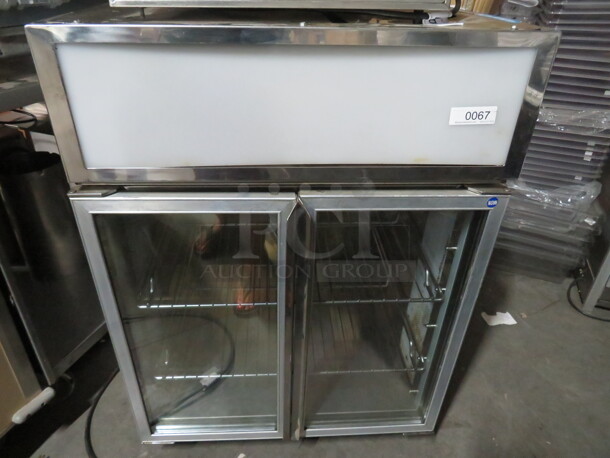One Taylor 2 Door Glass Refrigerator With 2 Racks. 115 Volt. #890-12. 27X27X39. - Image 1 of 2