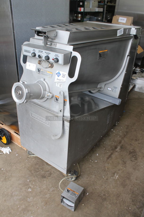 2018 Hobart MG2032 Metal Commercial Floor Style Electric Powered Meat Grinder w/ Foot Pedal on Commercial Casters. 208 Volts, 3 Phase.