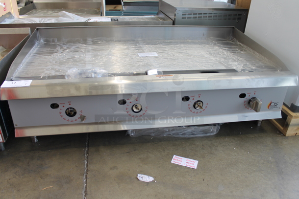BRAND NEW SCRATCH AND DENT! 2022 Cooking Performance Group CPG 351GTCPG48NL Stainless Steel Commercial Countertop Natural Gas Powered Flat Top Griddle w/ Thermostatic Controls. 120,000 BTU.  - Image 1 of 7