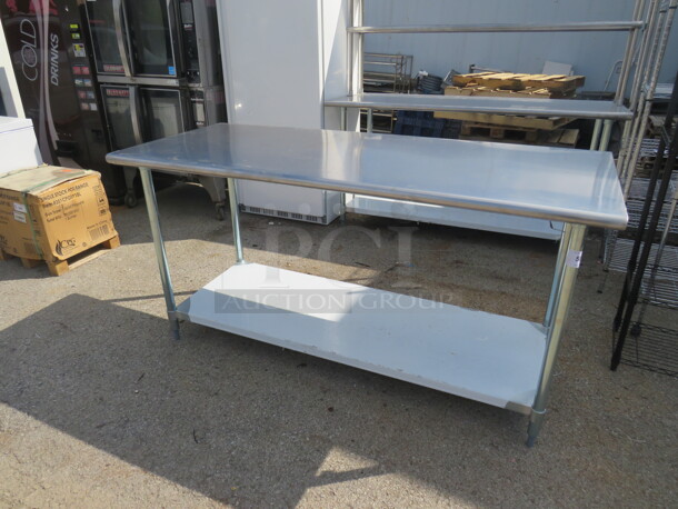 One NEW Stainless Steel Advance Tabco Table With Under Shelf. 72X30X36