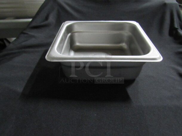 One 1/6 Size 2.5 Inch Deep Hotel Pan. 