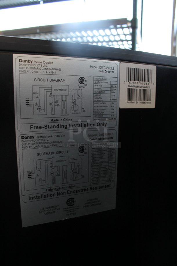 BRAND NEW SCRATCH AND DENT! Danby DWC458BLS Designer Series Metal Wine Cooler / Wine Cellar Merchandiser with 45 Bottle Capacity, 7 Slide-Out Wooden Racks, Blue LED Lighting and Tempered Glass Door. 115 Volts, 1 Phase. Tested and Working!
 - Image 4 of 5