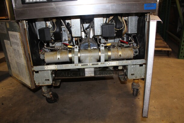 FABULOUS! Frymaster Model FPPH255BLCSC Commercial Stainless Steel Natural Gas Double Floor Fryer With Filtration System,Well Covers And Basket Racks On Casters. 31x36x56. Working When Pulled! - Image 4 of 7