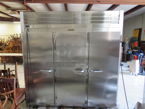 One WORKING Traulsen 3 Door Stainless Steel Refrigerator With 9 Racks. 115 Volt. Model# G30011-032. 76.5X32X84 - Image 1 of 2
