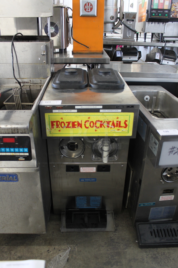 Taylor Stainless Steel Commercial Countertop 2 Flavor Slushie Frozen Beverage Machine.  - Image 1 of 4