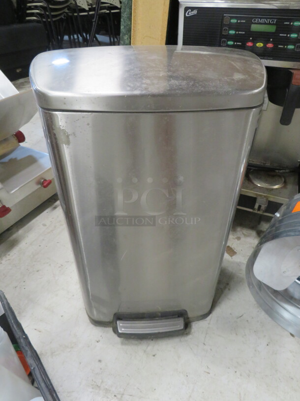 One Tramontina Stainless Steel Step Trash Can. - Item #1111943
