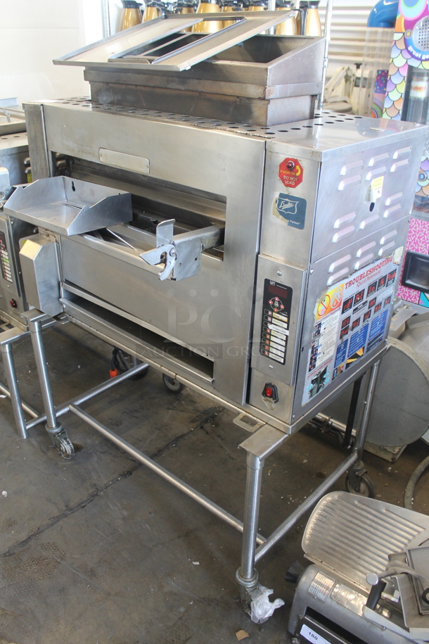 Duke Stainless Steel Commercial Natural Gas Powered Charbroiled Burger Grill on Commercial Casters. - Image 1 of 9