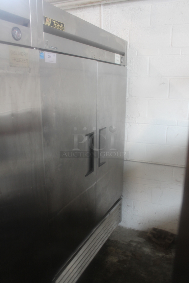 2013 True T-49F ENERGY STAR Stainless Steel Commercial 2 Door Reach In Freezer w/ Poly Coated Racks on Commercial Casters. 115 Volts, 1 Phase. Tested and Working! - Image 1 of 5
