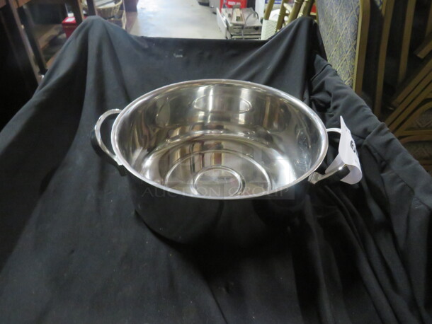 One 9 Inch Round Stainless Steel Pan.