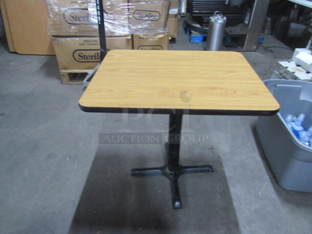 One Laminate Table Top On A Pedestal Base. 24X30X30