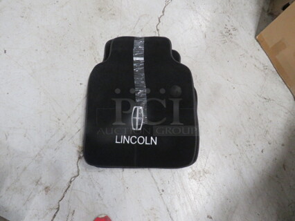 One Lot Of 4 NEW Lincoln Auto Floor Mats.