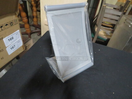 One NEW Tabletop Magnetic Menu Holder. 