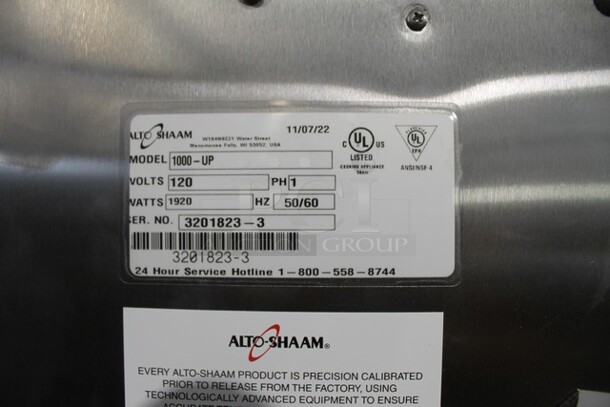 BRAND NEW! 2022 Alto Shaam 1000-UP Stainless Steel Commercial 2 Half Size Door Reach In Warming Holding Cabinet. Comes w/ 3 Commercial Casters. 120 Volts, 1 Phase. Stock Picture Used As Gallery. Tested and Working! - Image 9 of 12