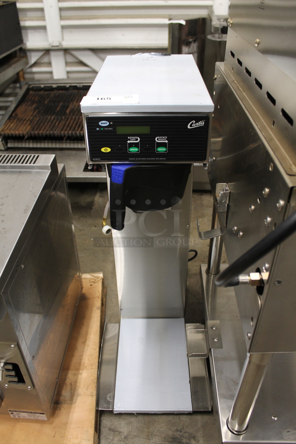 	BRAND NEW SCRATCH AND DENT! Curtis RTB Stainless Steel Commercial Countertop Iced Tea Machine w/ Poly Brew Basket. Stock Picture Used as Gallery: Does Not Come w/ Beverage Holders. 120 Volts, 1 Phase. Tested and Working! - Image 2 of 7