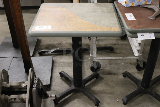 Tan and Gray Green Table on Black Metal Table Base. Stock Picture - Cosmetic Condition May Vary. 24x20x30